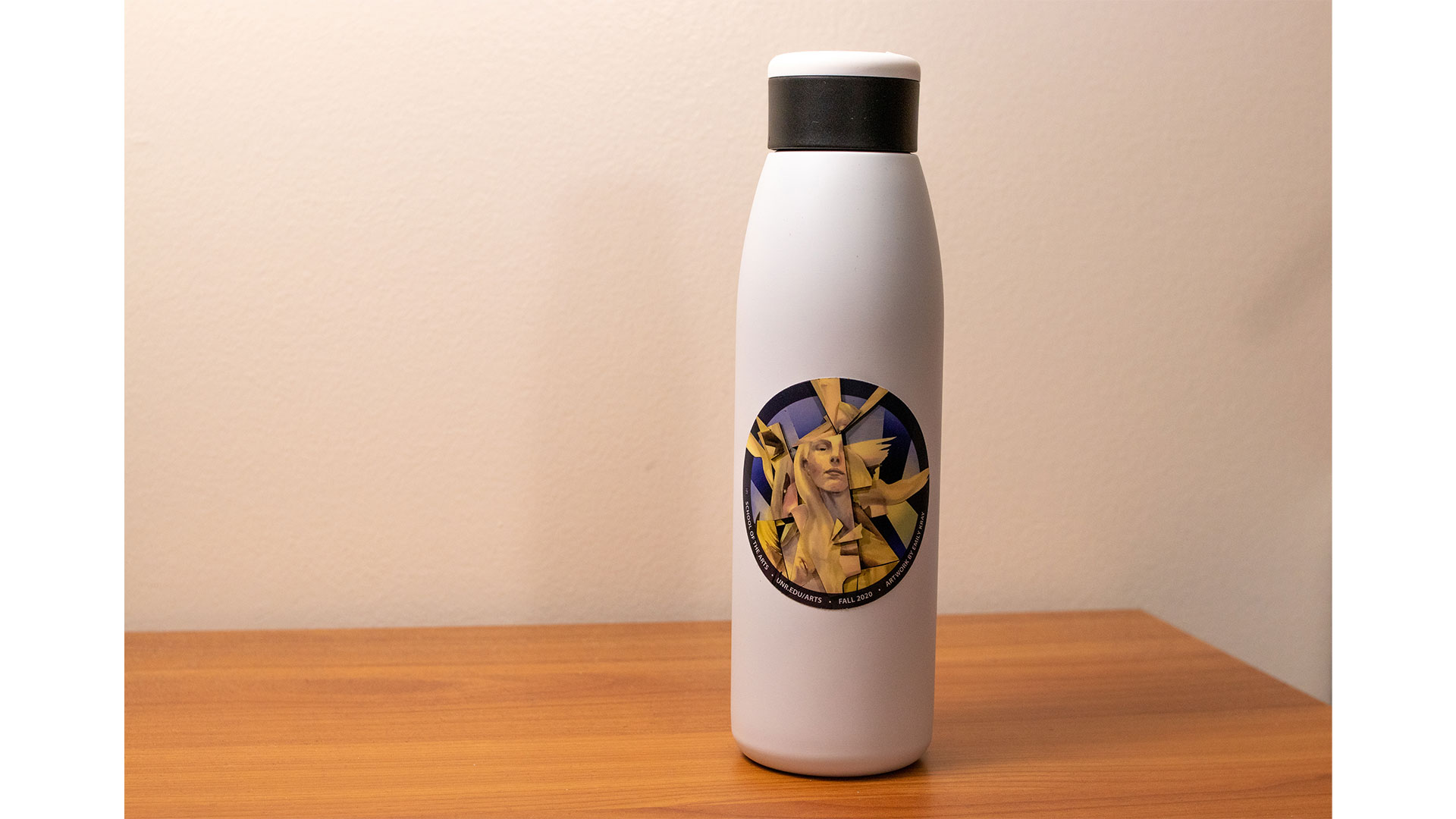 Fall 2020 sticker featuring on water bottle on desk