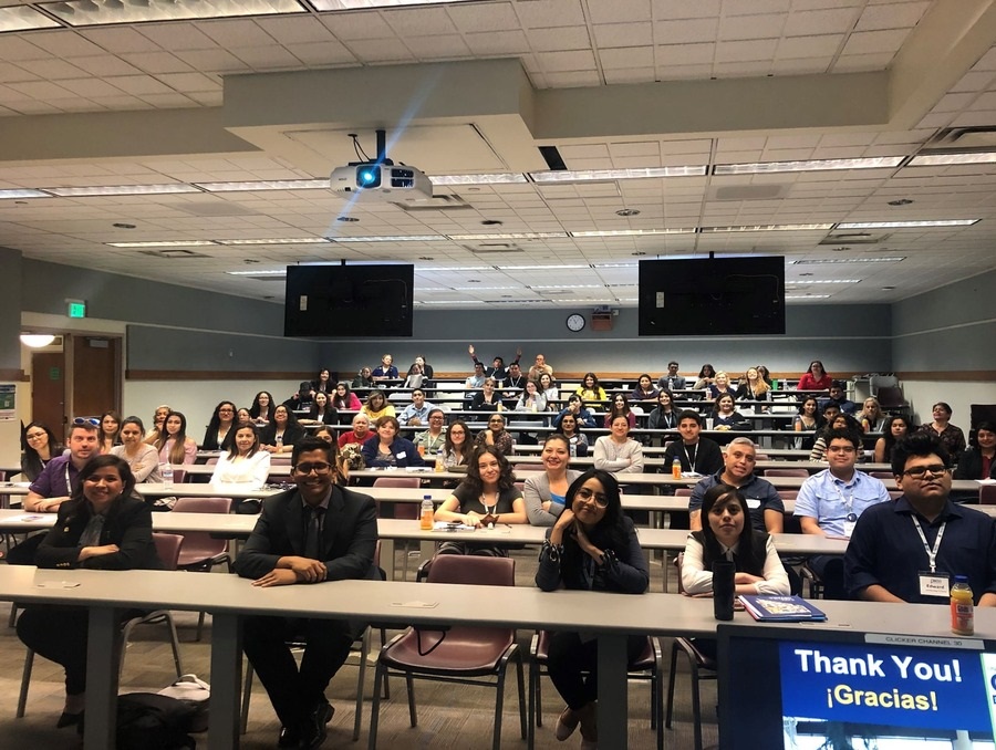 A large group of students gathered to learn science in a University classroom