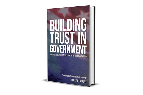 image of Building Trust in Government book cover featuring a diffused image of the American Flag with title copy overlaid.