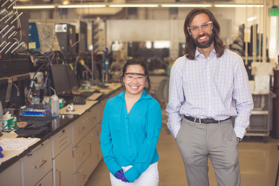 Christopher Barile stands in his lab with postdoctoral fellow Hanqing Pan