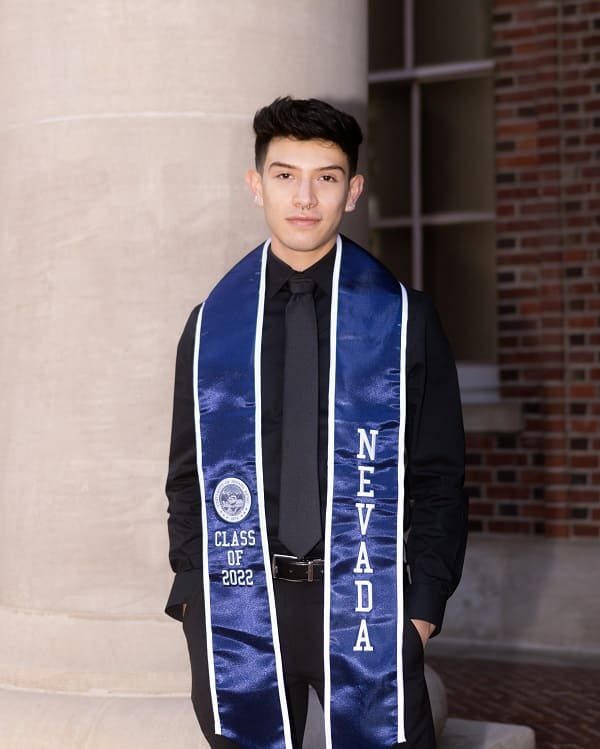 Edgar Padilla in graduation regalia