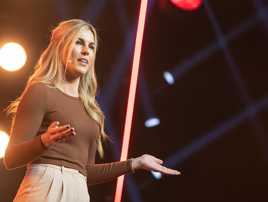 Liv Moore gives her talk on the TEDxReno stage.