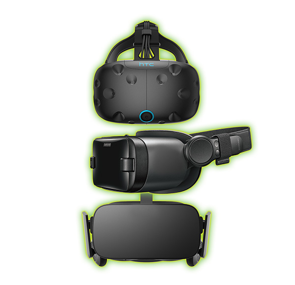 Photo of three different VR headsets stacked vertically in a column.
