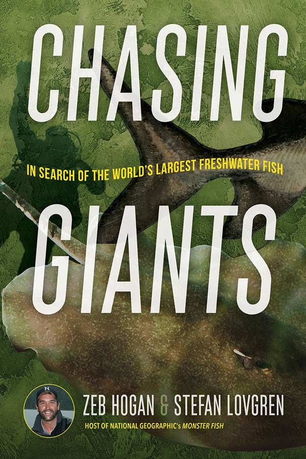 A book cover featuring illustrated fish in murky green water and a diver in the background with a title that reads, "Chasing Giants: In Search of the World's Largest Freshwater Fish"
