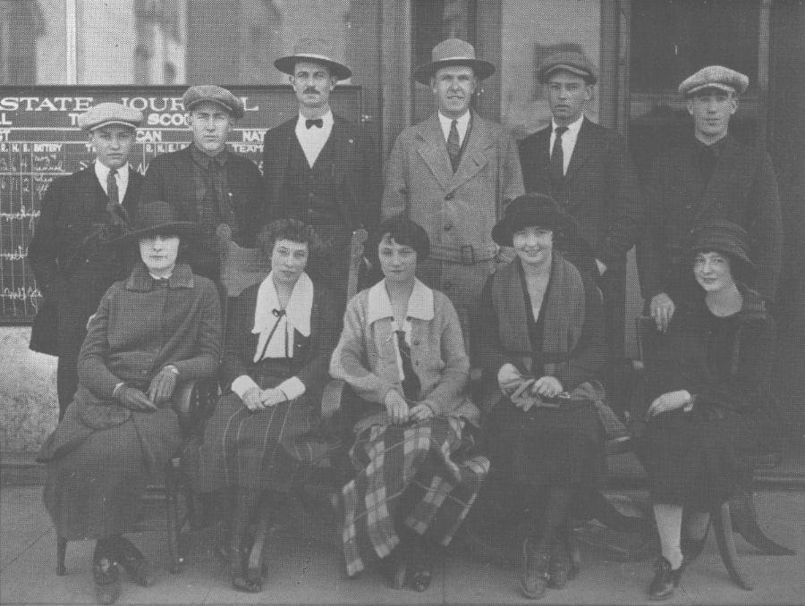 A black and white photo of the 11-person first journalism class at the University of Nevada.