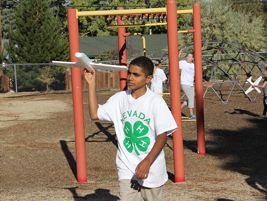 4-H youth with drone. 