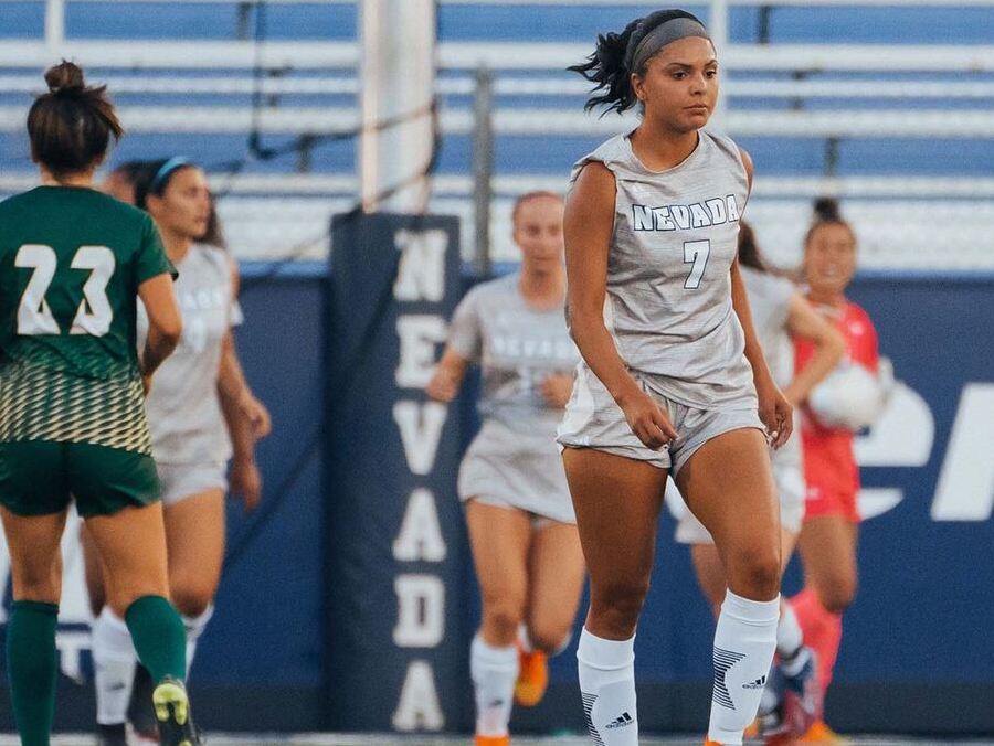 Arreaga on field in game during home soccer opener in Mackay Stadium. 