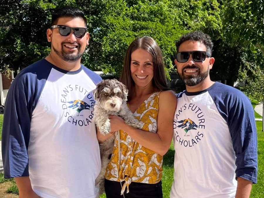 Manuel Ortiz, assistant director; Mariluz Garcia, executive director; Sammy Rosales, summer program coordinator and Tuna (Mariluz’s dog)