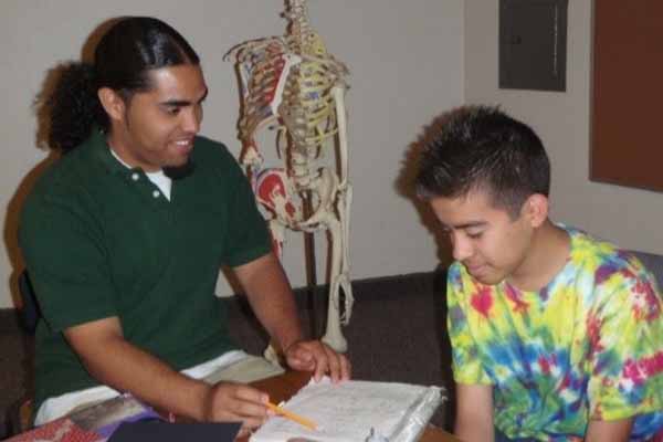 Ortiz mentoring a student