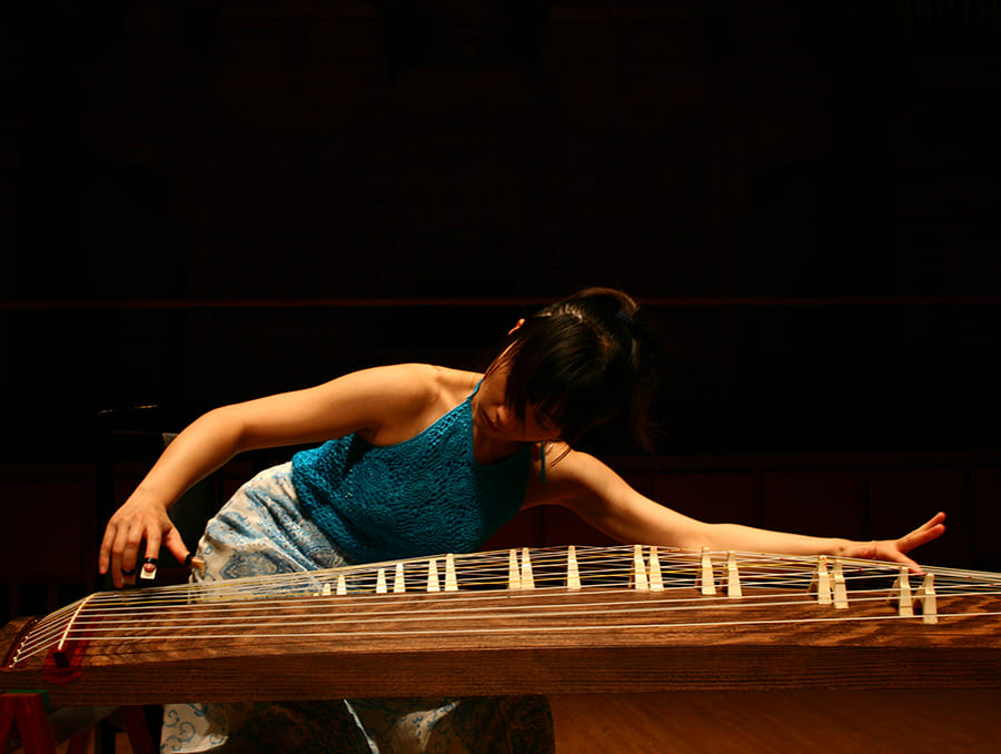 Yumi Kurosawa playing Japan's national instrument, the koto.