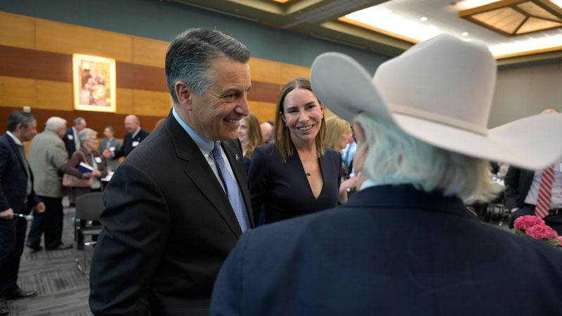 President Sandoval and Lauralyn Sandoval in conversation with Carl Bernstein.