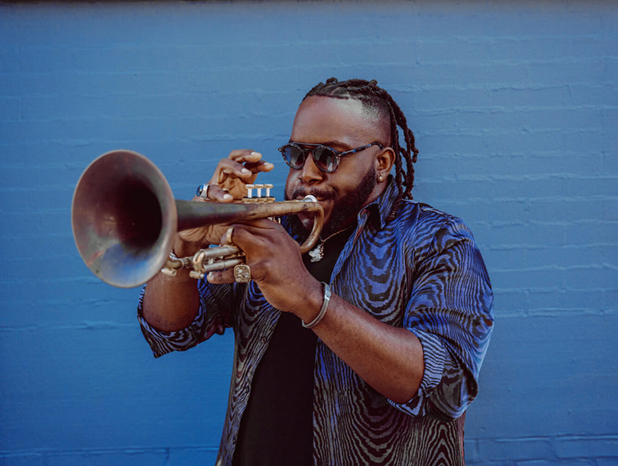 Marquis Hill playing the trumpet.