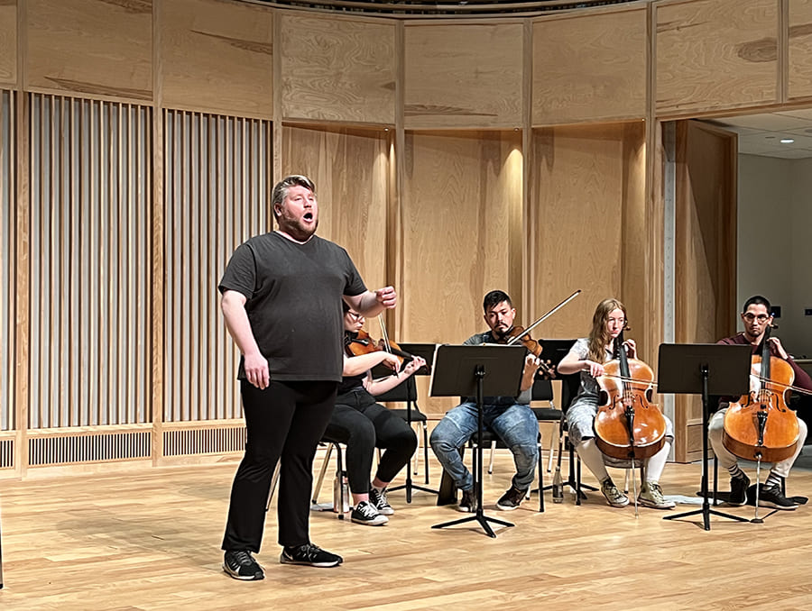 The cast of “Acis and Galatea” rehearsing for their upcoming performance. From left to right: Randall Smith singing with Oihana Villanueva, Miguel A. González Sáenz, Olivia Knock and Diego Marrero Perez playing string instruments.