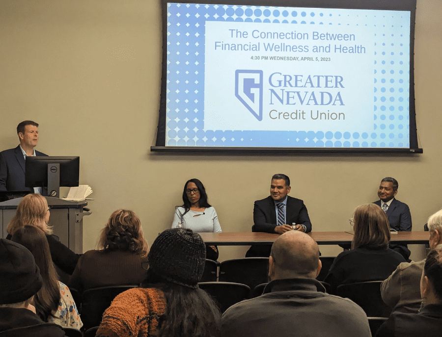 Panelists from Greater Nevada Credit Union, School of of Public Health and Renown Health share their insights with community members. 