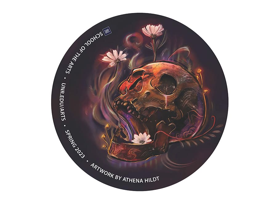 The winning sticker of the School of the Arts Spring 2023 Sticker Contest, depicting a skull with flowers growing out of it.