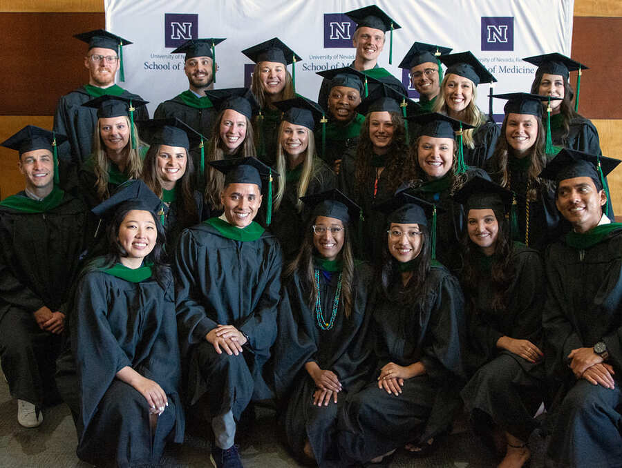 The 22 Physician Assistant (PA) Studies Program graduates at the University of Nevada, Reno School of Medicine (UNR Med) pose for a group photo following their commencement ceremony on Wednesday, July 26, 2023, at the Joe Crowley Student Union. 