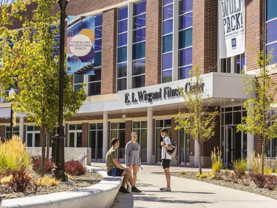 Students standing in front of the E. L. Wiegand Fitness Center