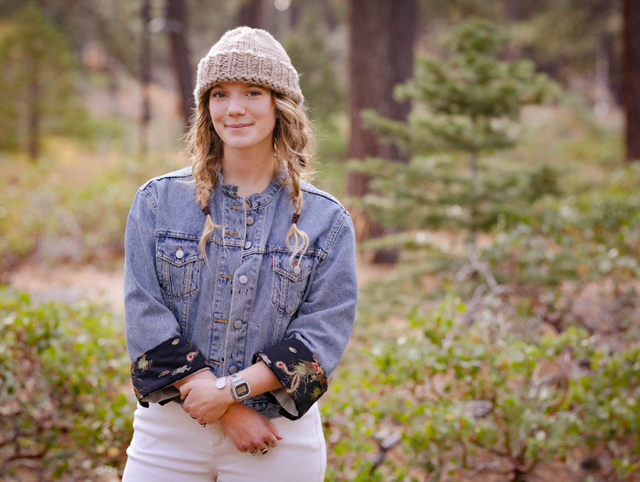 Emma Montgomery outside in the woods