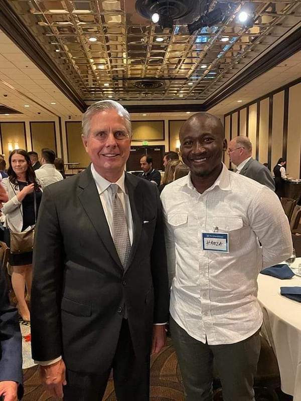 Dean Mosier poses with Dr. Asumah at an event.