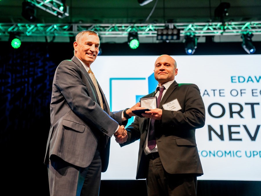 EDAWN President & CEO Mike Kazmierski shakes hands with NCAR Executive Director Carlos Cardillo