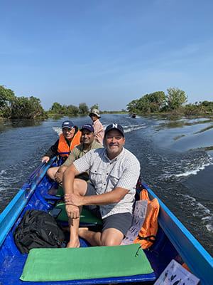 Hogan, Chandra and Sandoval in small boat