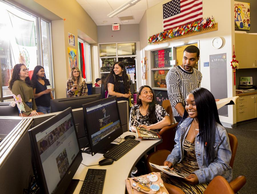 Students studying and learning in the Multicultural Center on campus in the Pennington buliding.