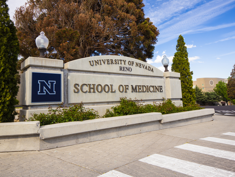 The University of Nevada, Reno School of Medicine monument sign seen from the street.