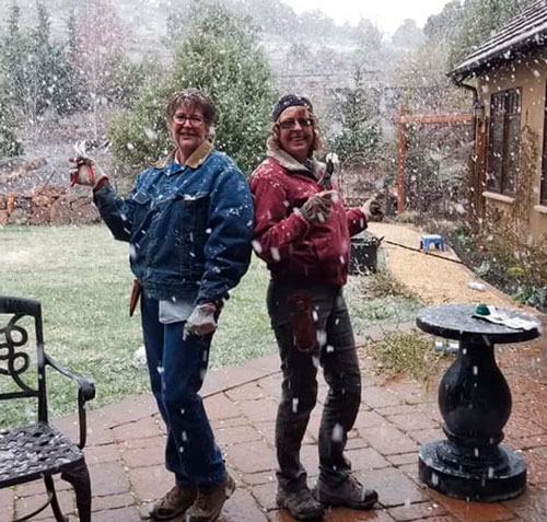 Photo of two women outside in snow