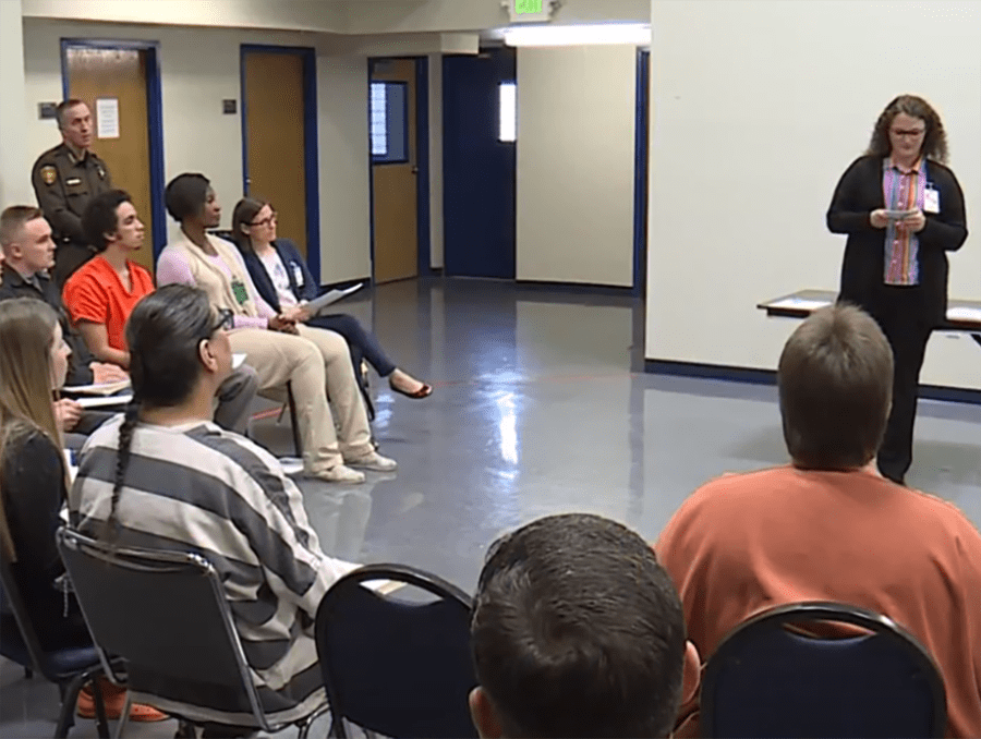 A professor lecturing to a class of students in the University of Nevada, Reno Inside-Out Program.