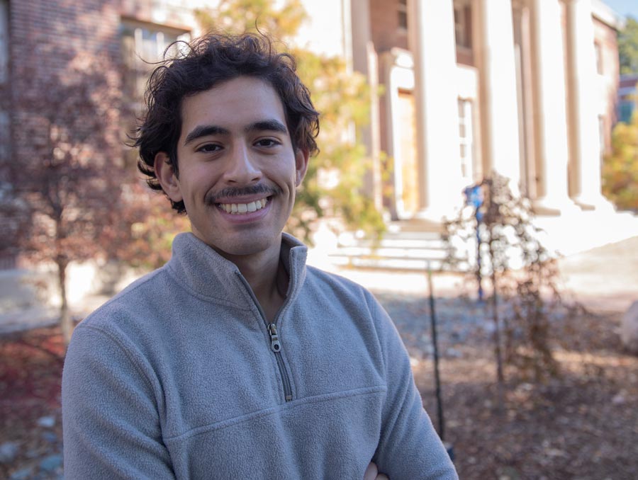 Jesus Diaz Sanchez smiles outside of the Mackay Mines building.