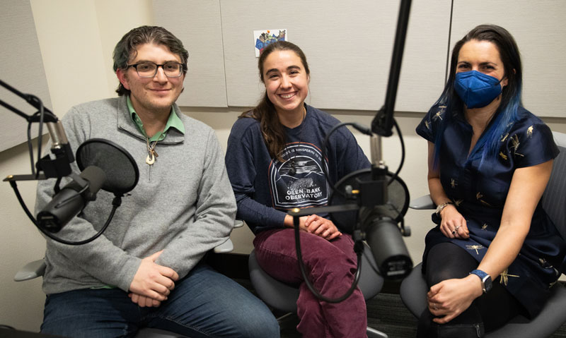 Three podcast participants in the Radio studio