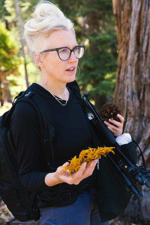 Emily Ward Bivens holds natural found objects