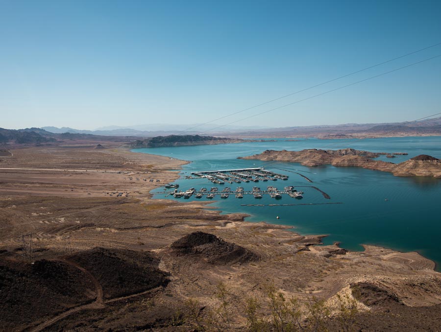 A photo from a high vantage point of Lake Mead. The water levels are low as indicated by the bathtub rings around the lake.