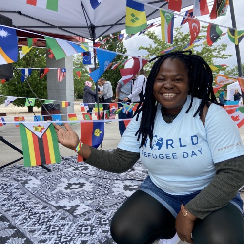 A woman smiles at the Northern Nevada International Center festival.