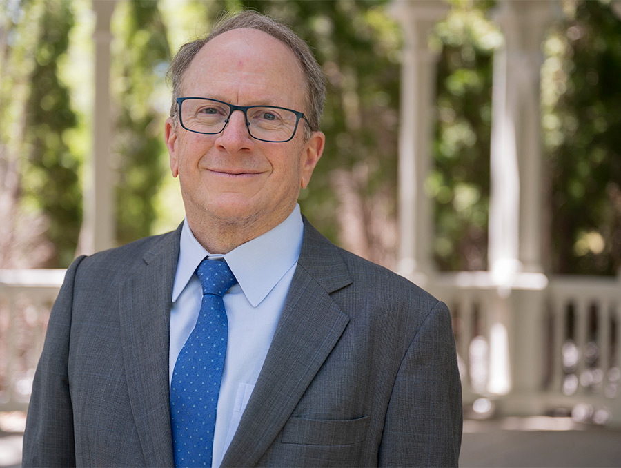 Dean Al Stavitsky standing in the gazebo on campus