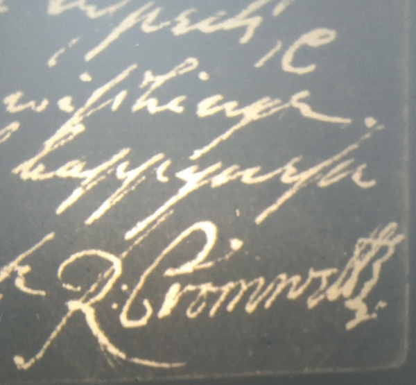 Microfilm image of Richard Cromwell’s signature on a letter from the 1650s. Dark and light tones are reversed due to microfilm photography process.