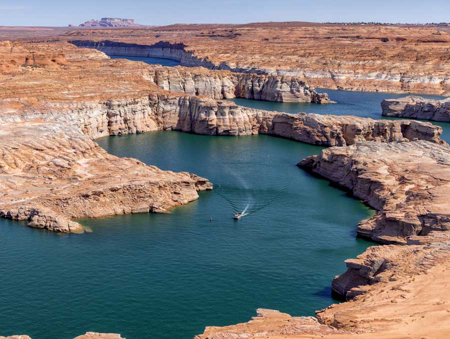 An aerial photo of Lake Mead with a boat on it.