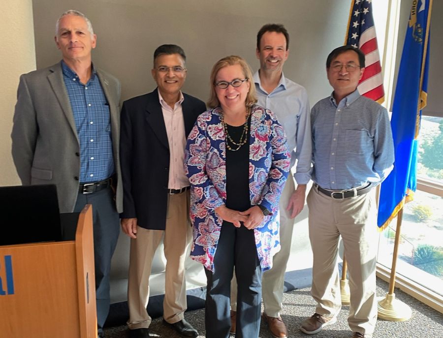 Leaders from the School of Public Health and the Desert Research Institute posing for a photo together.