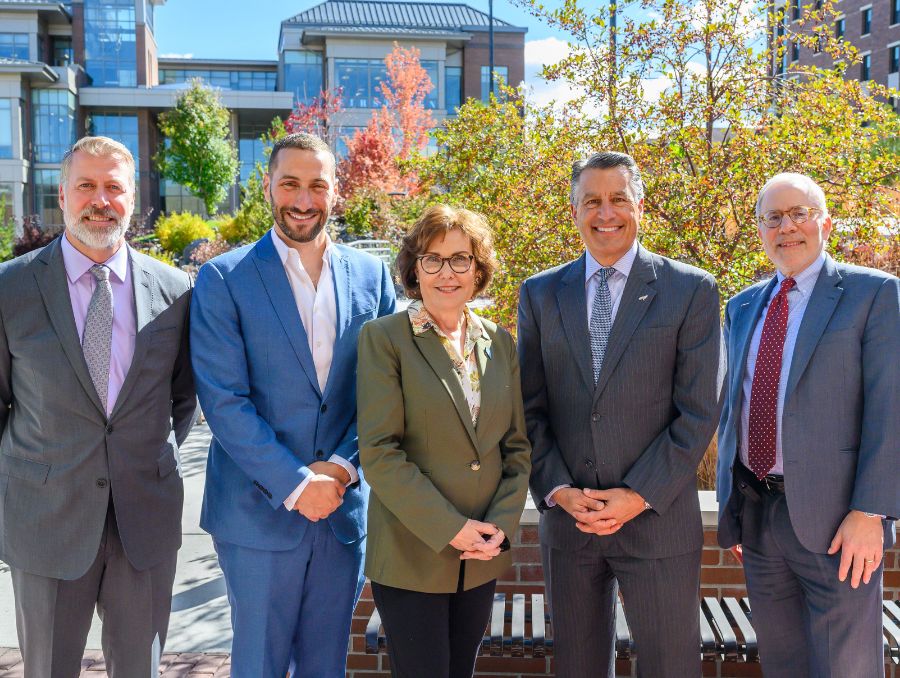 UNR Med and Renown Health leadership pose for photo with Senator Jacky Rosen.