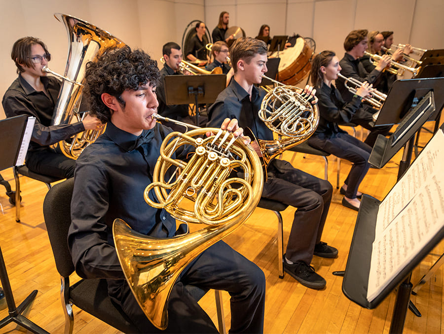 Students playing brass instruments.