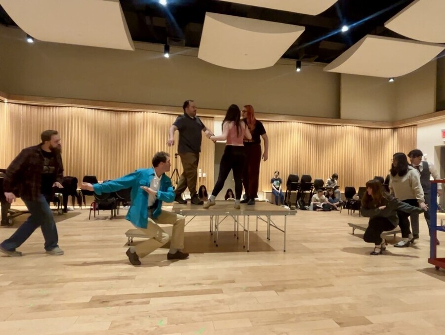 Students rehearsing in a dance class.