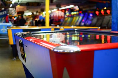 Air hockey tables in an arcade