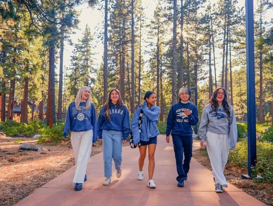 Group of students walking in the trees in Lake Tahoe.