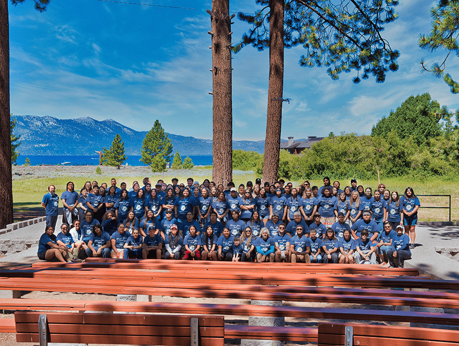 Camp attendees pose for a group picture at Lake Tahoe.