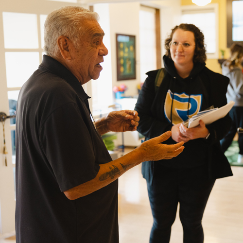 Man speaks to a group