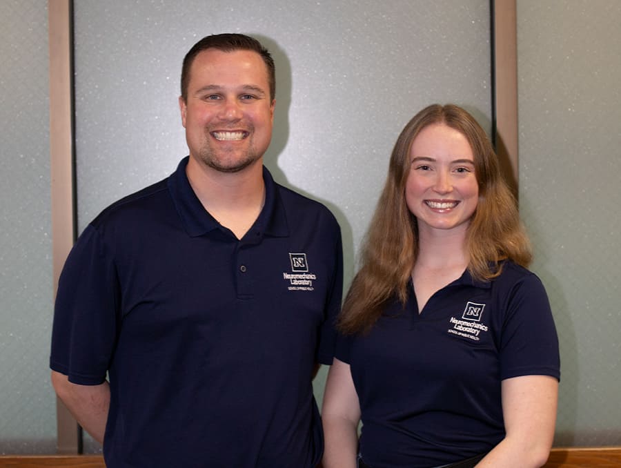 Nicholas Murray and Stella Thornton smiling next to each other. 