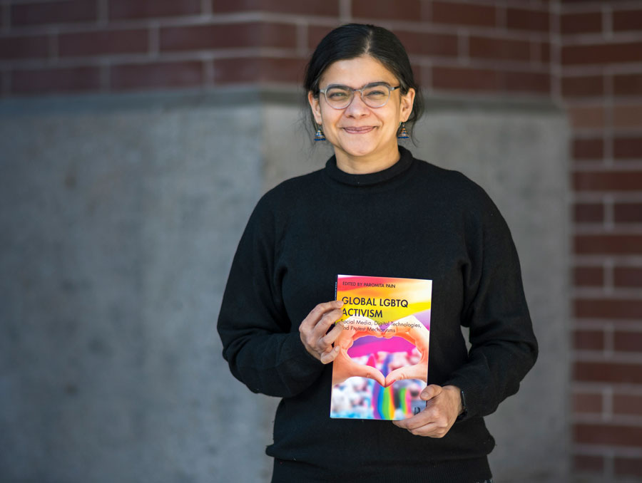 Paromita Pain holding her book.