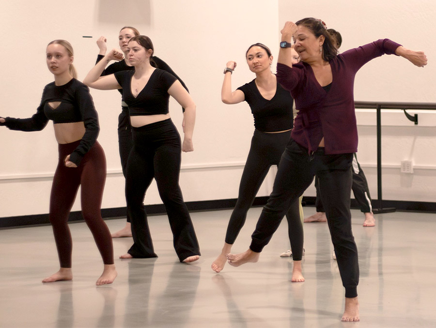 Students dance in a studio classroom