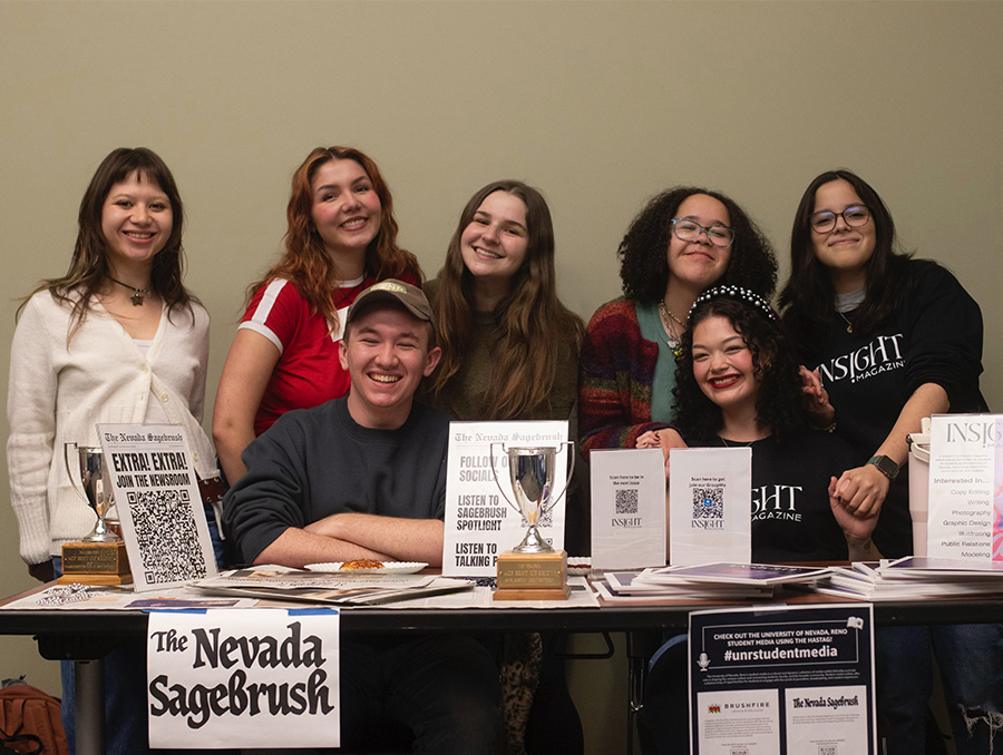 Students from the Sagebrush and Insight Magazine tabling at a job fair.