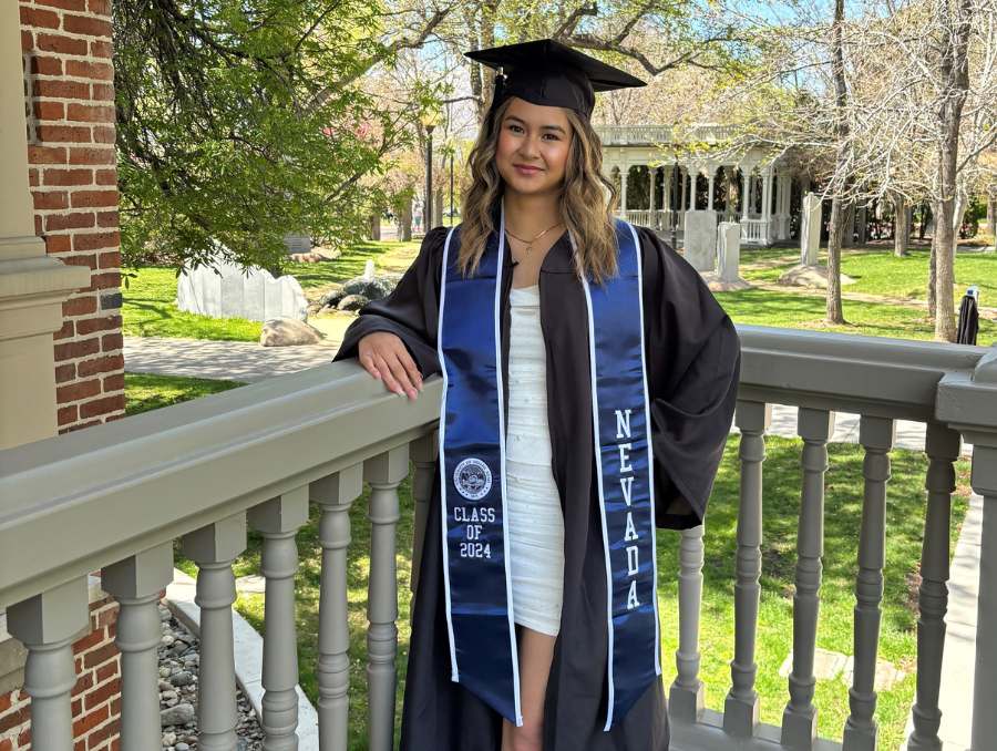 Ashley Kate Nazaire in graduation attire.